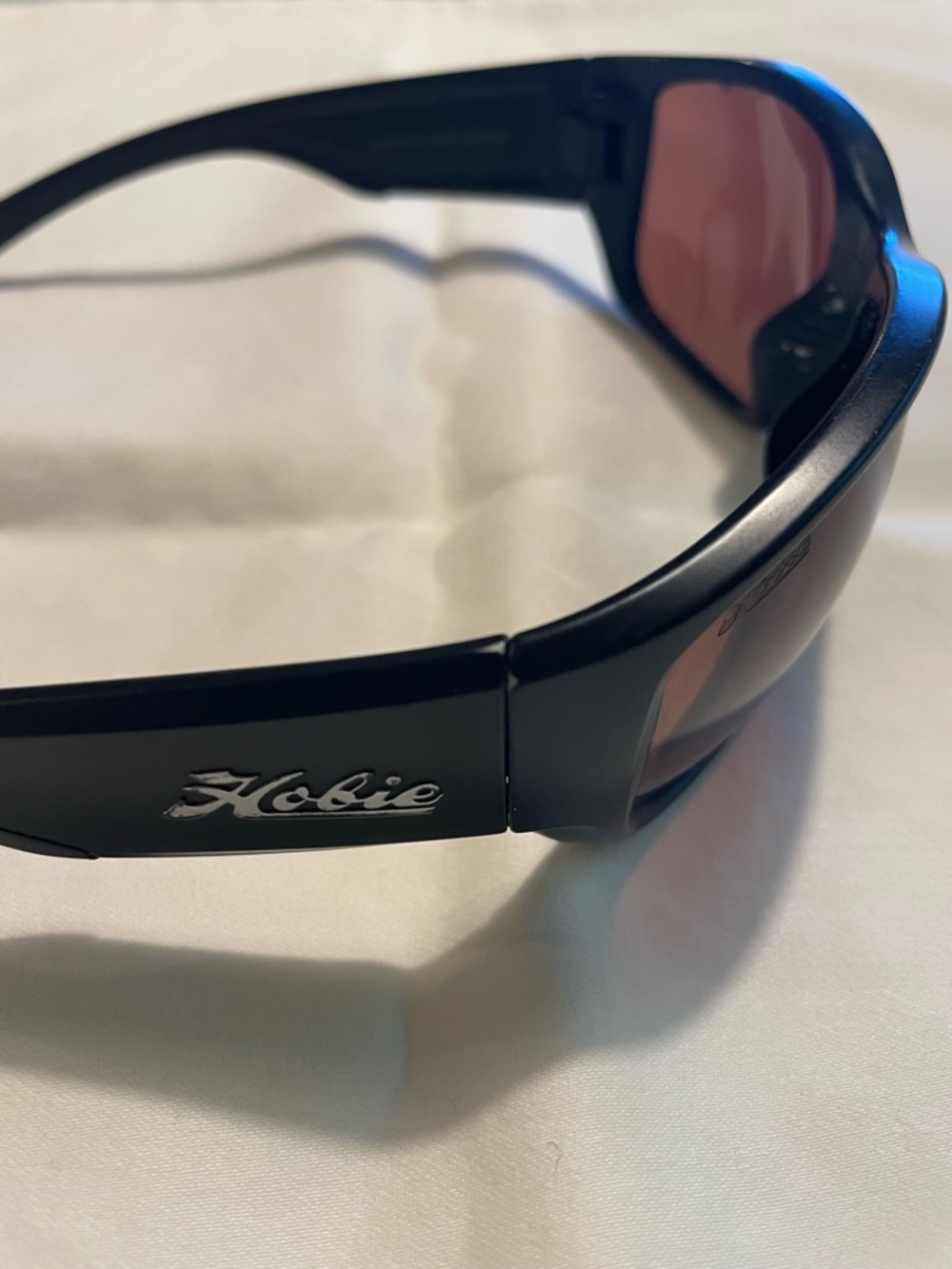 Hobie Black Frame Sunglasses with Pink Lenses